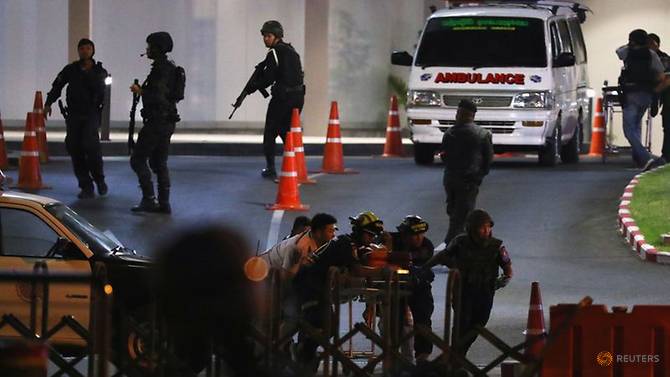 a-member-of-thai-security-forces-is-carried-out-after-a-raid-inside-the-terminal-21-shopping-mall-to-try-to-stop-a-soldier-on-a-rampage-after-a-mass-shooting--nakhon-ratchasima--thailand-2